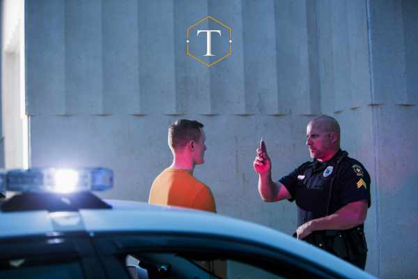 a police officer conducting a field sobriety test